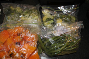 Broccoli, beans and cubed pumpkin ready for the freezer