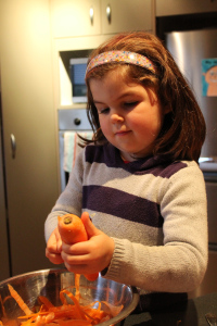 Helpers in the kitchen this afternoon peeling carrots